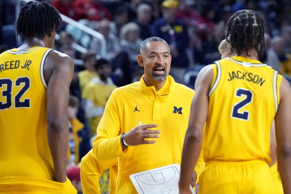 Michigan fires Juwan Howard the former Fab Five star after five